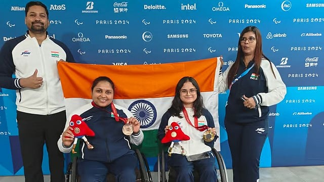 PCI : Indian shooters Avani Lekhara and Mona Agarwal celebrate with their coaches after winning medals in the Women’s 10m Air Rifle Standing SH1 event at the Paris Paralympics 2024.